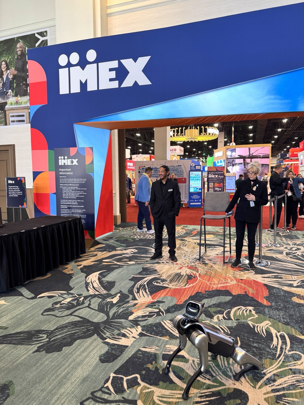 RoboDog robot dog greeting attendees at the IMEX America entrance in Las Vegas
